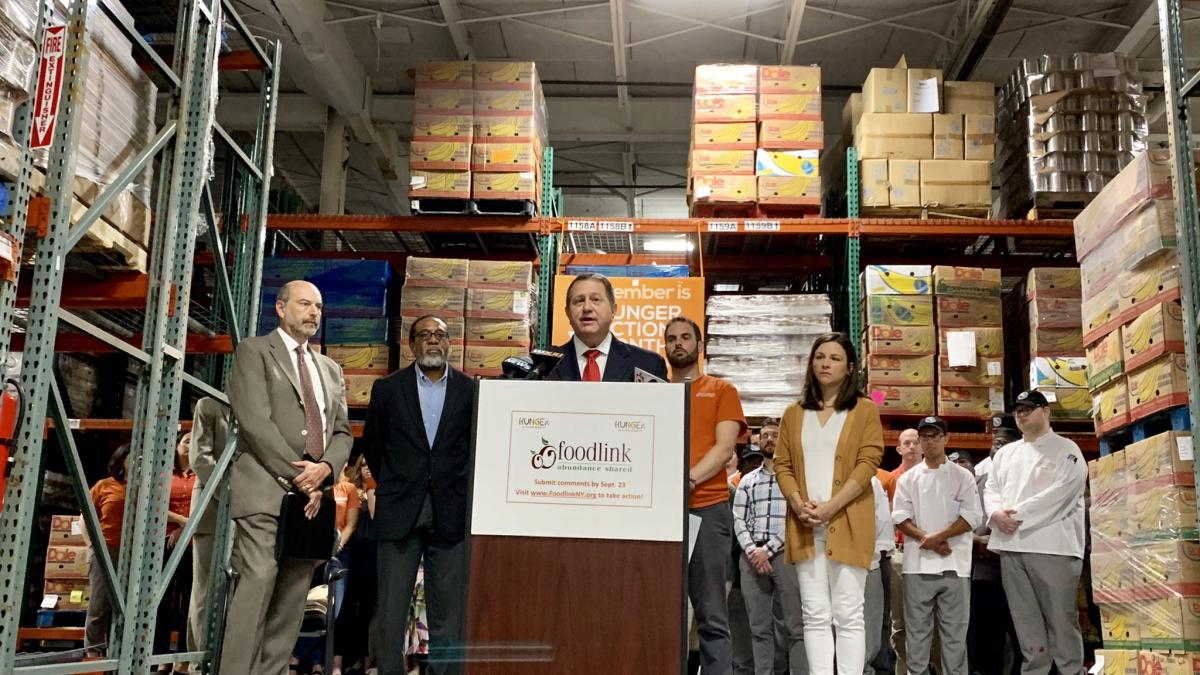 Congressman Morelle speaking at podium at Foodlink