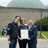 Joe, Hillary, and Dan pose at RMSC for a photo
