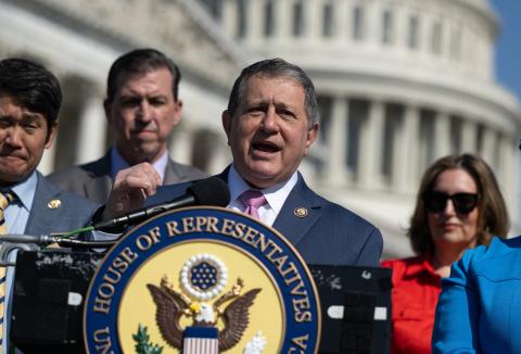 Congressman Morelle stands at a podium at a press conference speaking.