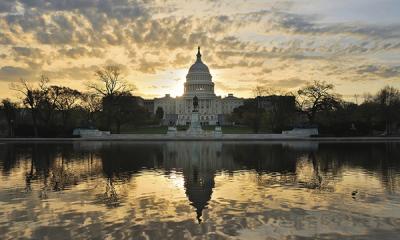 US Capitol Building with sunrise sky